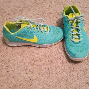 Neon green and blue Nike sneakers
